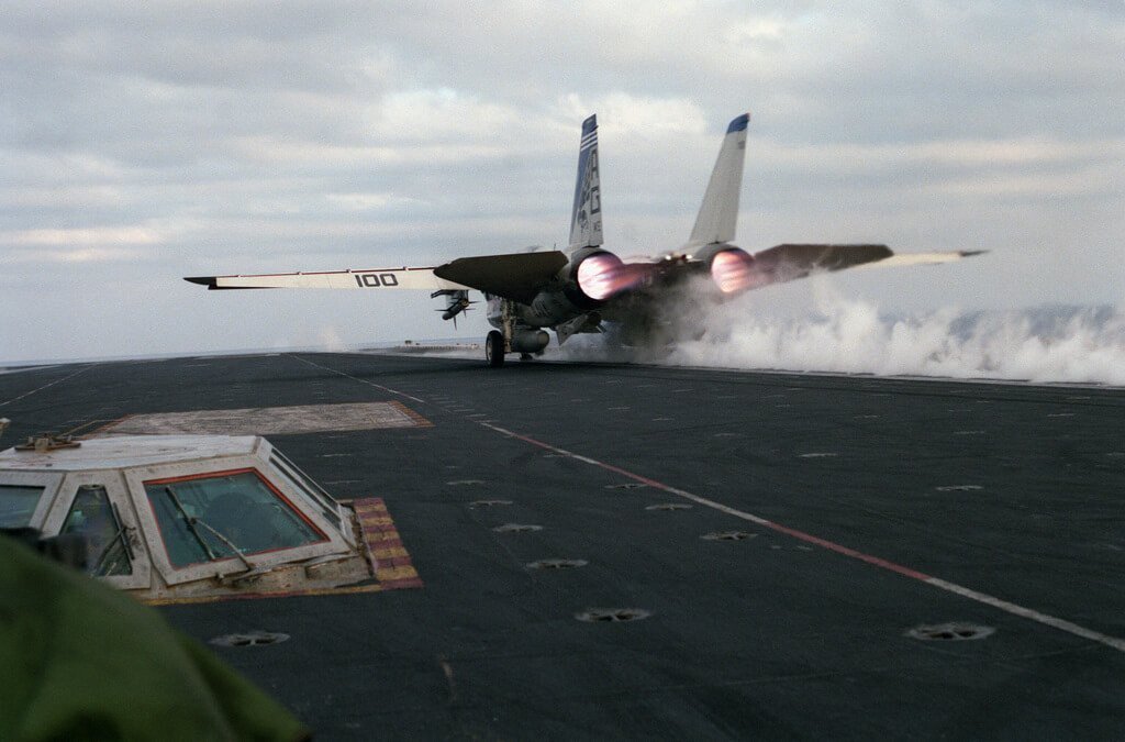f-14 Tomcat launching from aircraft carrier - dale snodgrass